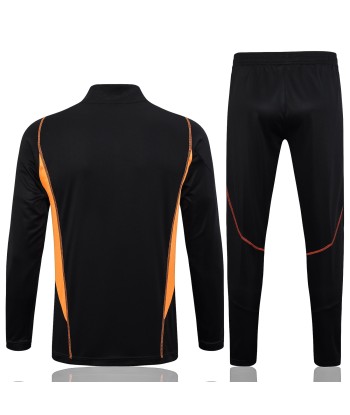 INTERNACIONAL 1/2 ZIP BLACK/ORANGE Comparez et commandez 